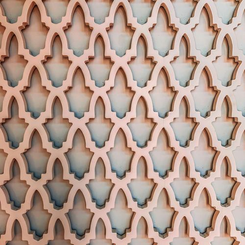 A visual metaphor for consistency, like stacked stones or a repeating pattern.